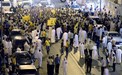 Sza�d-ar�biaiak a Hezbollah z�szl�ival t�ntetnek