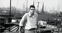 Allen Ginsberg  as photographed by William S. Burroughs  on the rooftop of his Lower East Side apartment, between Avenues B and C, in the Fall of 1953.